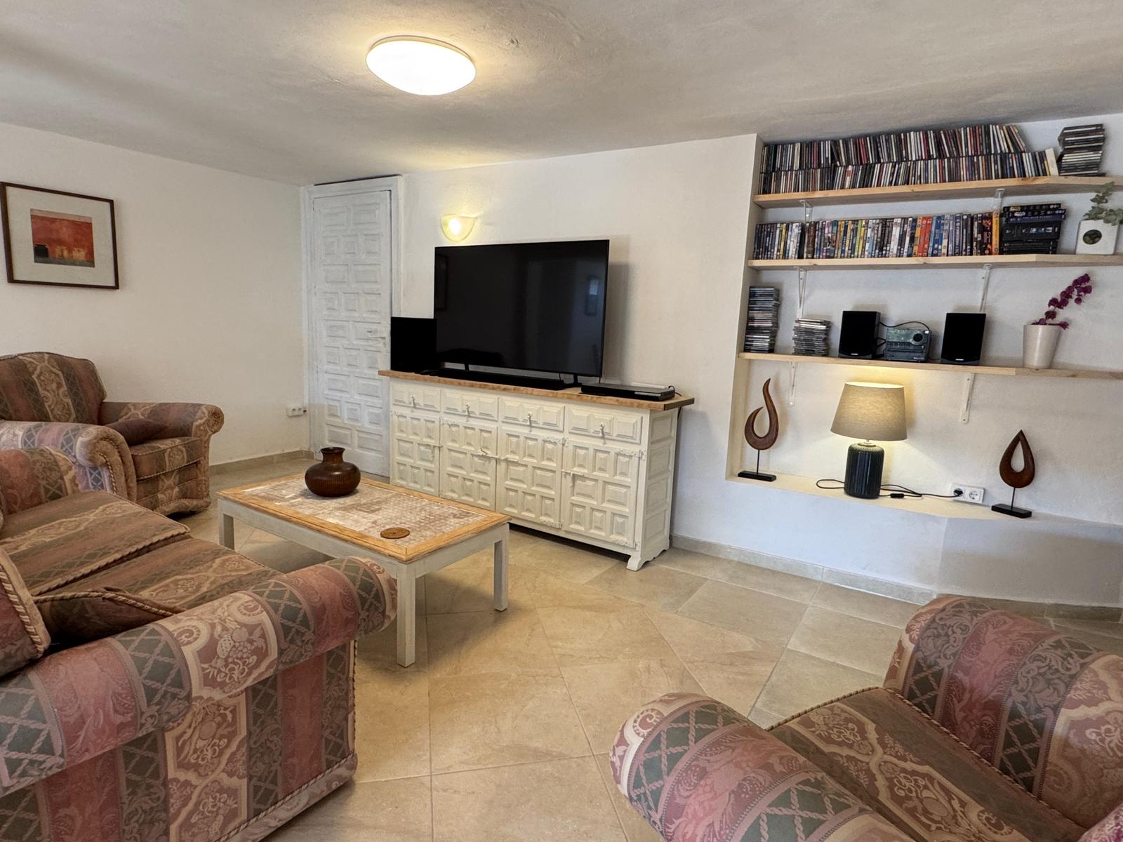 Living room with sofas and bookshelves