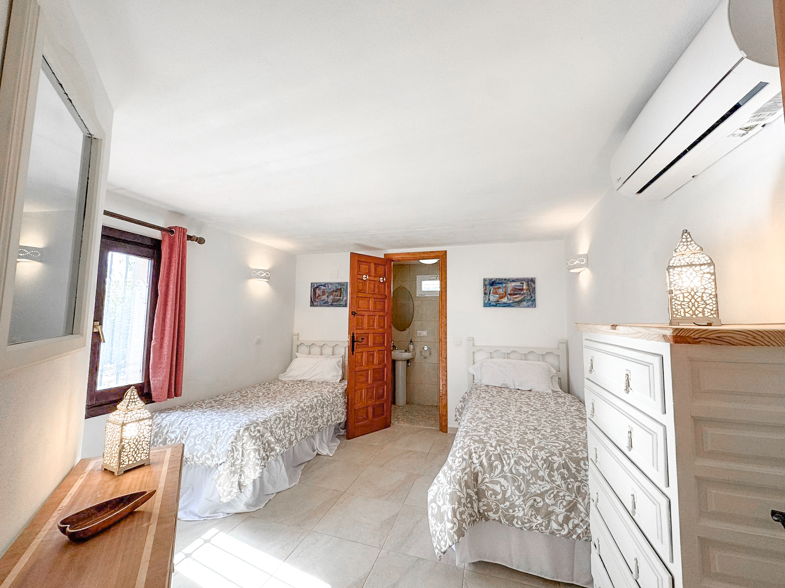 Bedroom 7 — twin bedroom with Moroccan-style decor